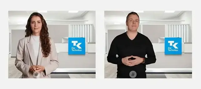 Zwei Personen stehen vor einem modernen Empfangsbereich mit dem Logo der Techniker Krankenkasse (TK) an der Wand im Hintergrund.